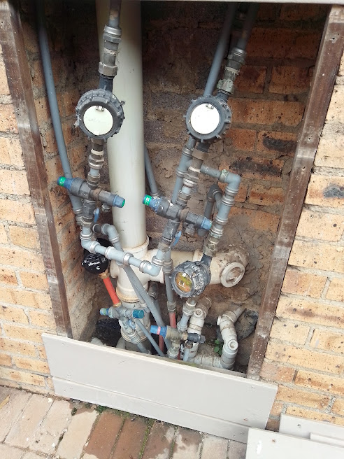 Neatly repaired exterior plumbing installation