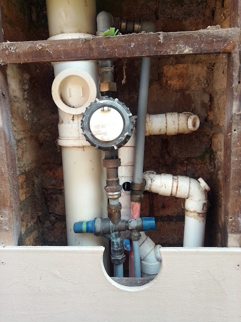 Plumbing repair inside an access panel